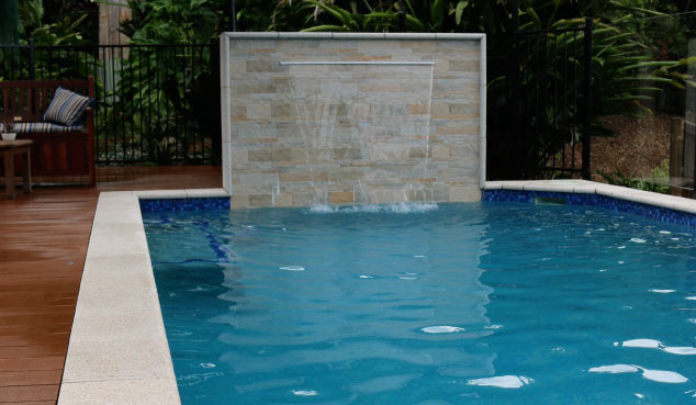 Waterfall at the deep end of a pool